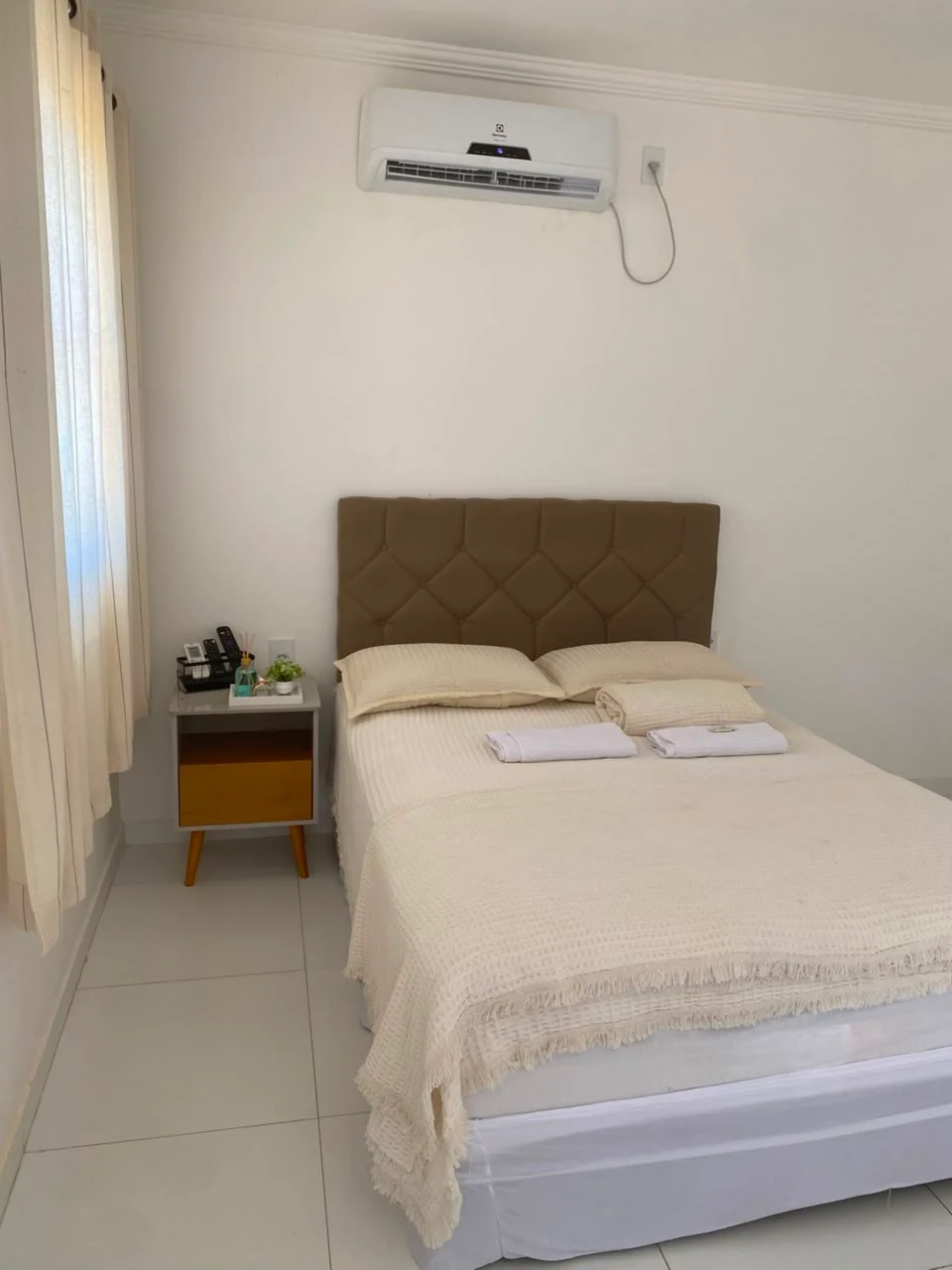 Quarto de casal com ar-condicionado