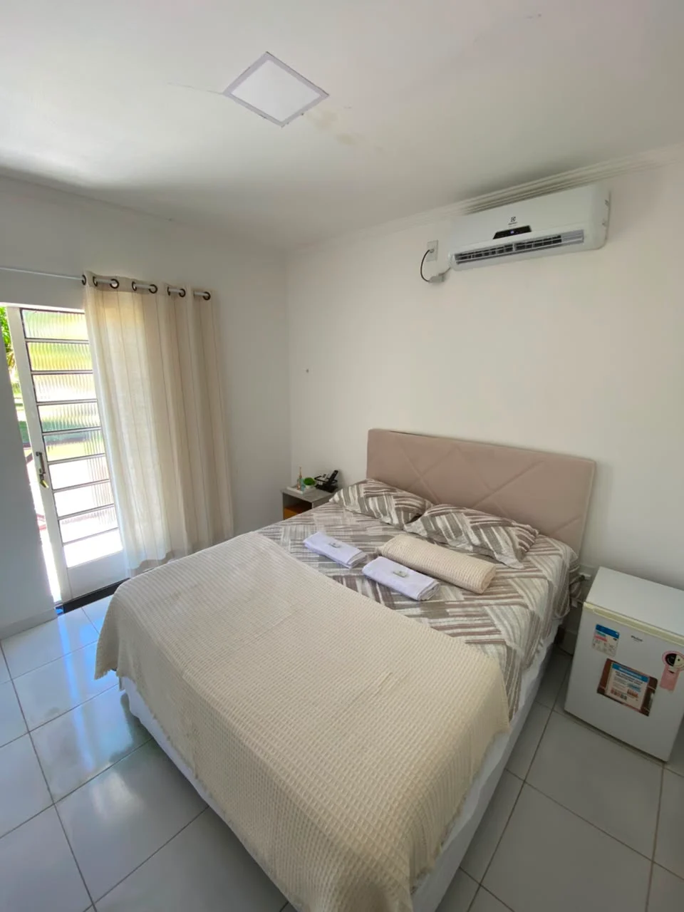Quarto com frigobar